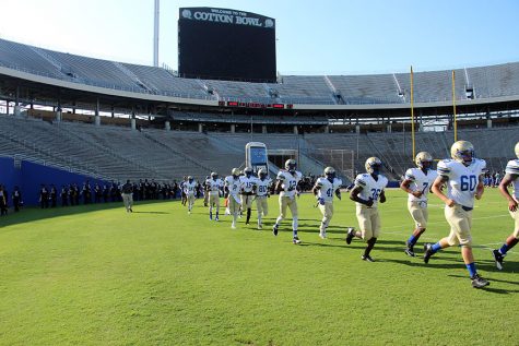 Varsity football wins two close games