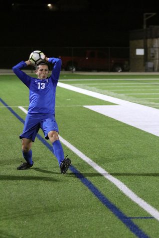 Junior Edward Leeper plays in varsity game against North Garland