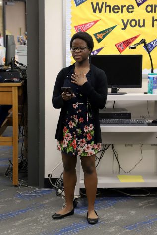 Sophomroe Abibatu Koroma reads during the literary festival