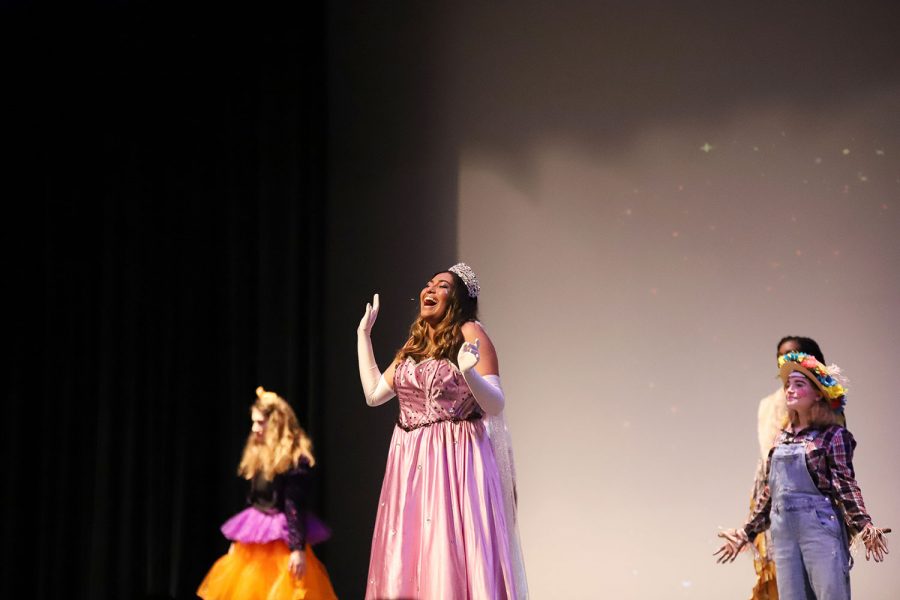 Junior Gabriela Machado smiles from the camera during her performance.